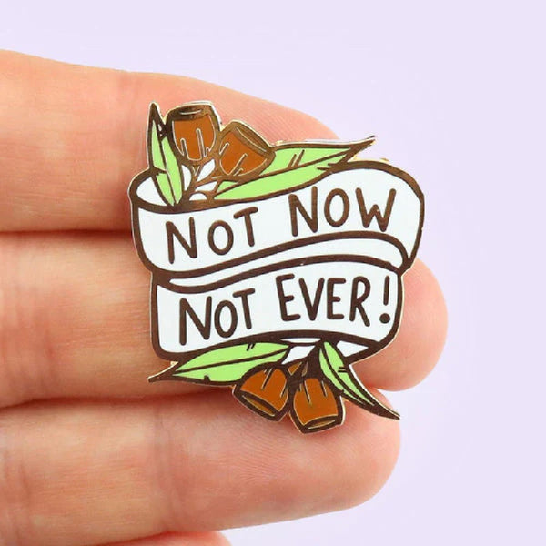 JUBLY-UMPH-Not-Now-Not-Ever-Lapel-Pin-On-Fingers