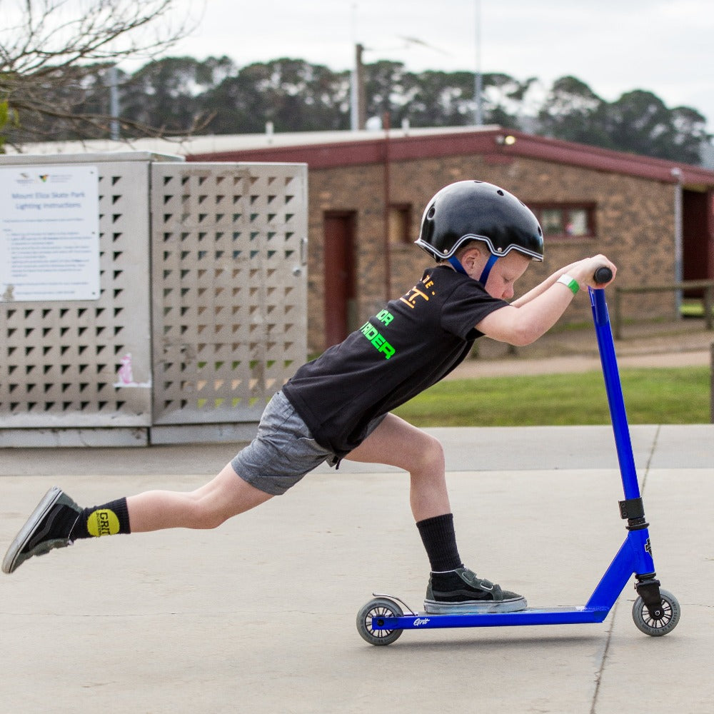 Grit-Atom-Stunt-Scooter-Being-Used-By-Child