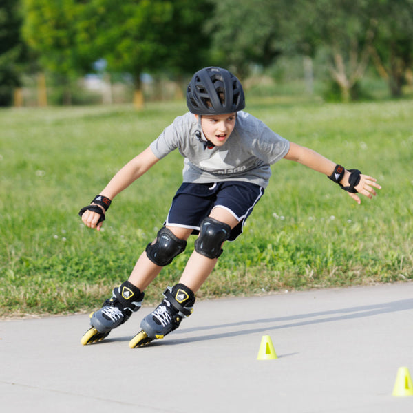 Rollerblade-APEX-Junior-Adjustable-Inline-Skate-Charcoal-Yellow-Lifestyle-View