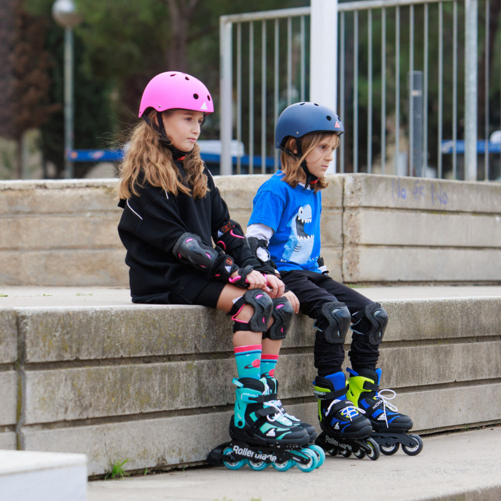 Rollerblade-Microblade-Junior-Adjustable-Inline-Skate-Black-Blue-Lifestyle-View-1