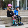 Rollerblade-Microblade-Junior-Adjustable-Inline-Skate-Black-Blue-Lifestyle-View-1
