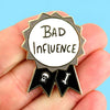 JUBLY-UMPH-Bad-Influence-Lapel-Pin-On-Fingers