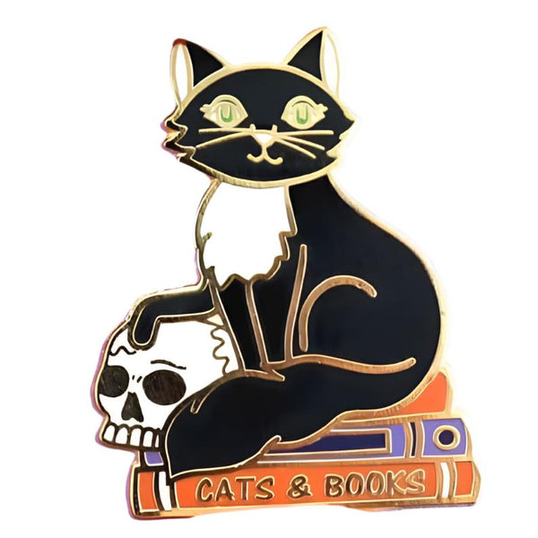 JUBLY-UMPH-Cats-And-Books-Lapel-Pin-between-fingers