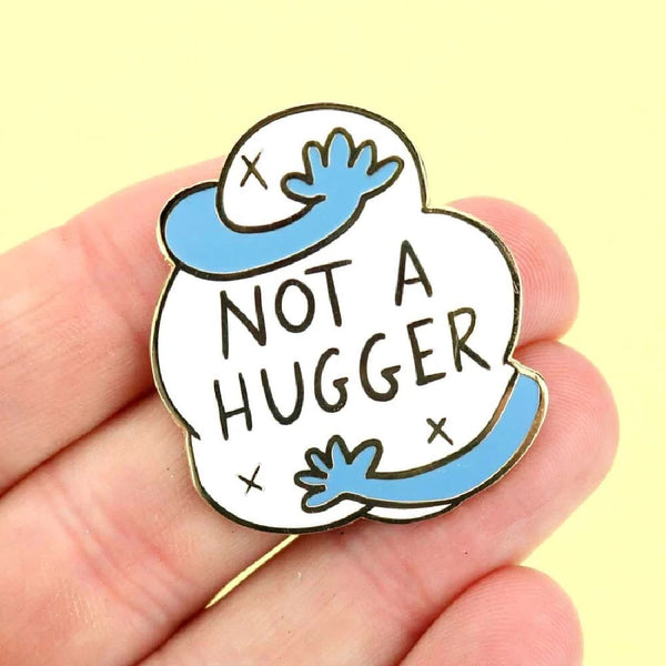 JUBLY-UMPH-Not-A-Hugger-Lapel-Pin-On-Fingers