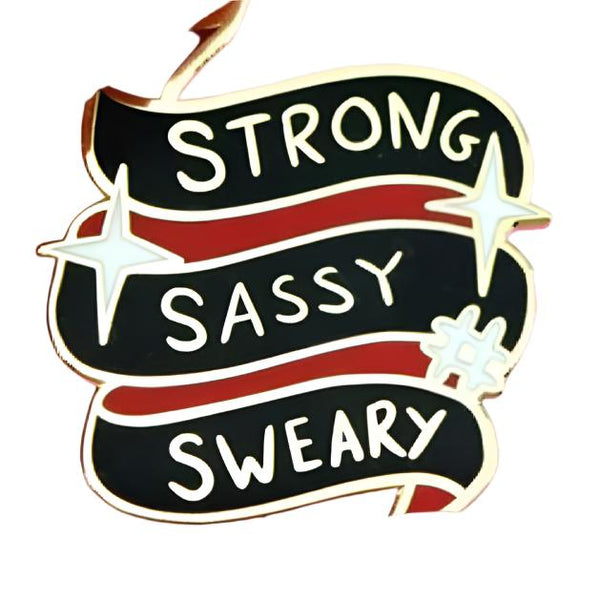 JUBLY-UMPH-Strong-Sassy-Sweary-Lapel-Pin-Between-Fingers